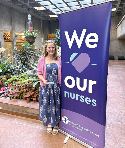 Thomas Receives Impact Award